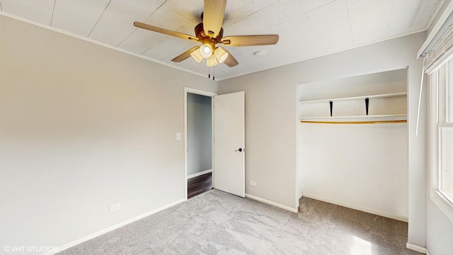 2525 Ridge Rd, Aurora, IL 60504 - unfurnished bedroom with carpet floors, a closet, a ceiling fan, and baseboards