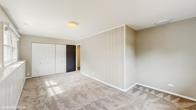 2525 Ridge Rd, Aurora, IL 60504 - unfurnished bedroom featuring carpet floors, baseboards, and a closet