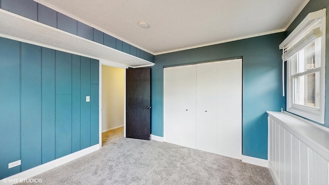2525 Ridge Rd, Aurora, IL 60504 - unfurnished bedroom featuring carpet floors, ornamental molding, a closet, and baseboards