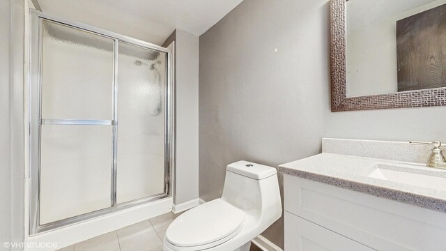 2525 Ridge Rd, Aurora, IL 60504 - full bath featuring toilet, a shower stall, vanity, baseboards, and tile patterned floors