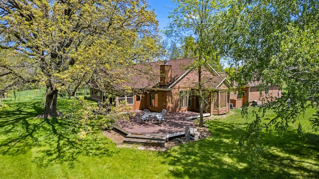3262 Greenwood Dr, Dewey, IL 61840 - back of house with a wooden deck and a yard