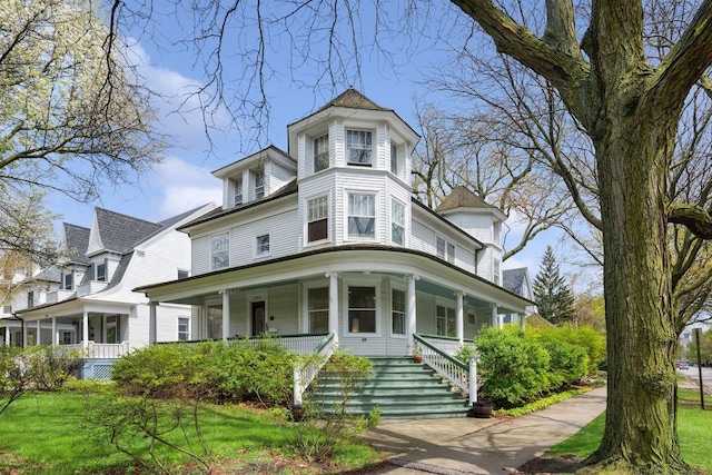 victorian-style house with a porch