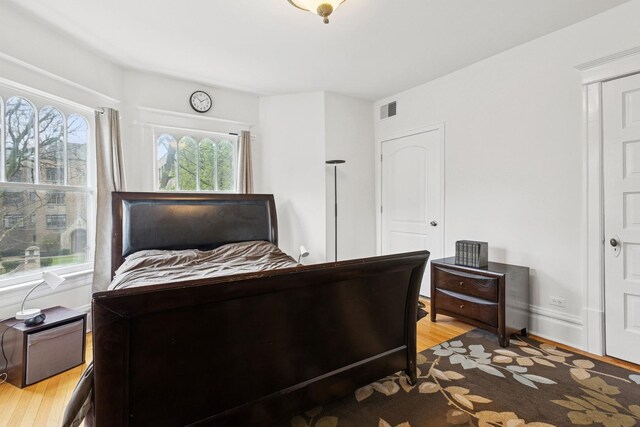 bedroom featuring light wood finished floors