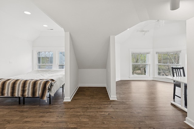 bedroom with lofted ceiling, wood finished floors, baseboards, recessed lighting, and ceiling fan