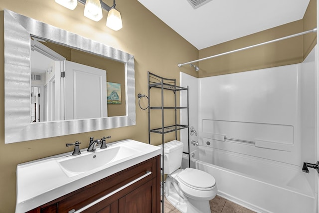 full bath featuring toilet, tile patterned floors,  shower combination, and vanity