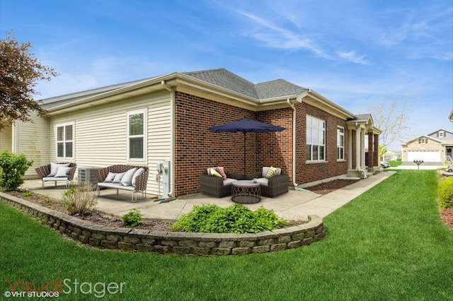 921 Eineke Blvd, Algonquin, IL 60102 - rear view of house featuring outdoor lounge area, a patio, a yard, and brick siding