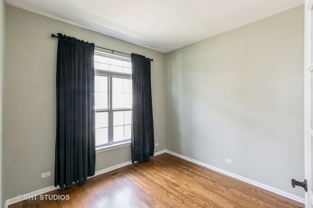 921 Eineke Blvd, Algonquin, IL 60102 - unfurnished room featuring wood finished floors and baseboards