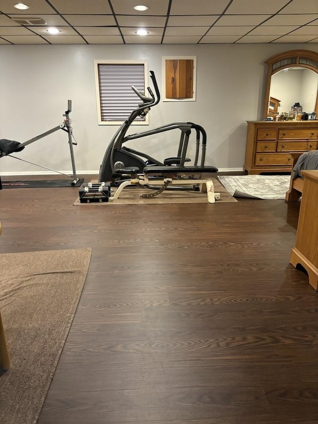 3991 Whispering Trails Dr, Hoffman Estates, IL 60192 - exercise room featuring baseboards, a paneled ceiling, wood finished floors, and recessed lighting