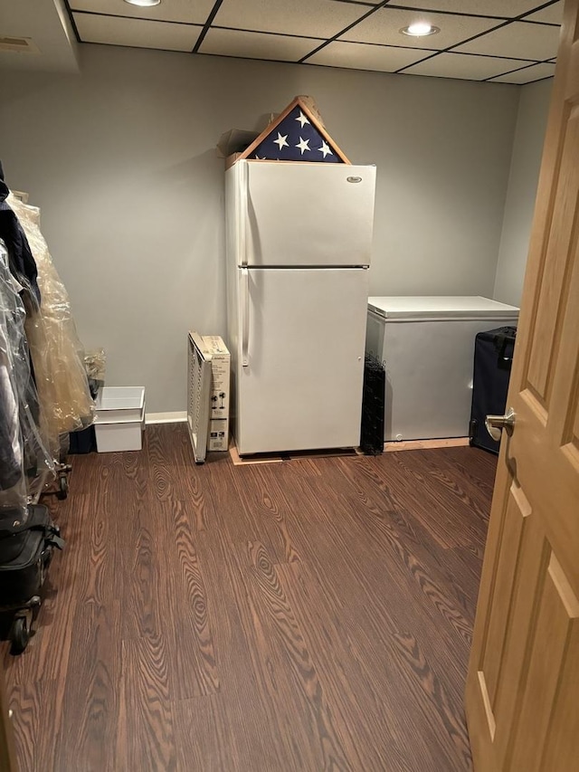 3991 Whispering Trails Dr, Hoffman Estates, IL 60192 - laundry area with dark wood finished floors and baseboards