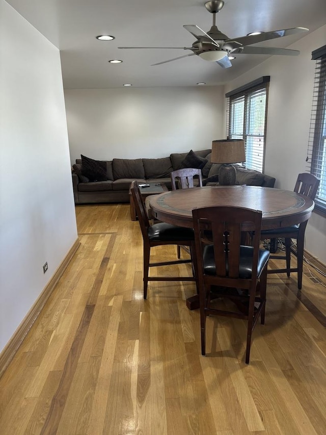 3991 Whispering Trails Dr, Hoffman Estates, IL 60192 - dining room with a ceiling fan and light wood-type flooring
