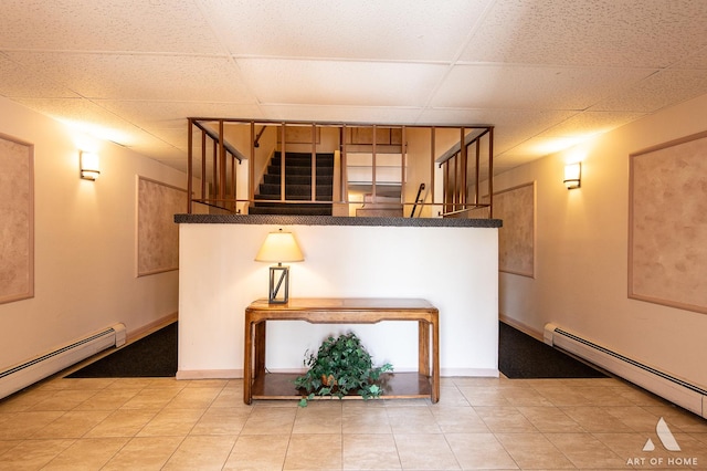 7930 Woodglen Ln Unit 204, Downers Grove, IL 60516 - interior space with stairs, a baseboard radiator, a paneled ceiling, and light tile patterned floors