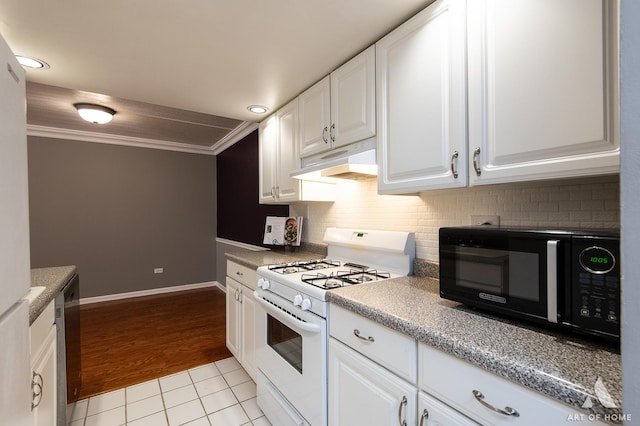 7930 Woodglen Ln Unit 204, Downers Grove, IL 60516 - kitchen featuring white range with gas stovetop, black microwave, under cabinet range hood, white cabinetry, and light tile patterned floors