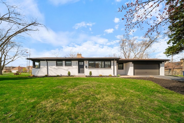 220 E Washington St, Des Plaines, IL 60016 - ranch-style house with a chimney, an attached garage, a front yard, driveway, and brick siding