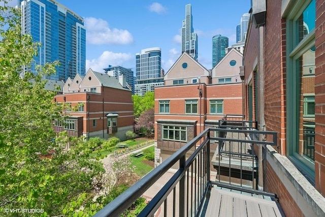 balcony featuring a city view