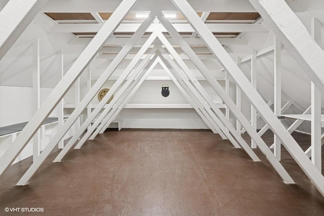 unfinished attic with stairway