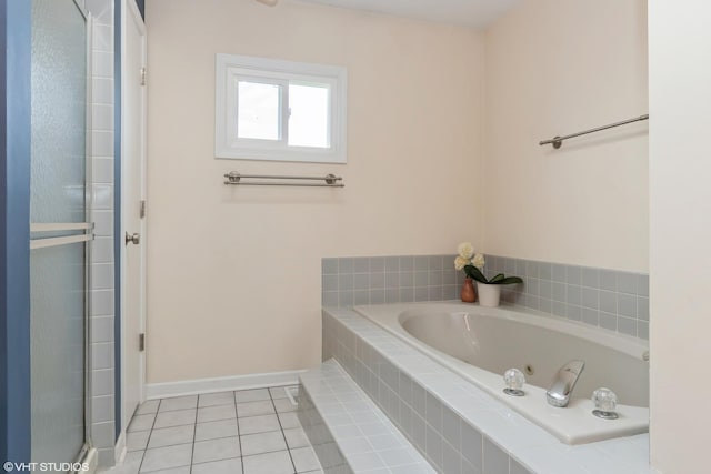 1449 Mesa Dr, Bolingbrook, IL 60490 - full bath with tile patterned floors, a bath, baseboards, and a tile shower