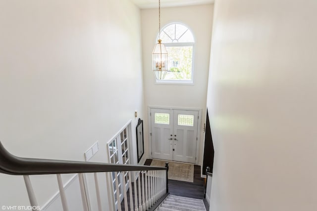 1449 Mesa Dr, Bolingbrook, IL 60490 - entryway featuring a high ceiling, wood finished floors, and a chandelier