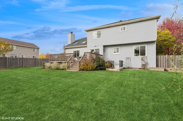 1449 Mesa Dr, Bolingbrook, IL 60490 - back of property with a wooden deck and a chimney