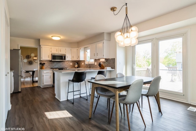 1449 Mesa Dr, Bolingbrook, IL 60490 - dining space with dark wood-type flooring and a chandelier