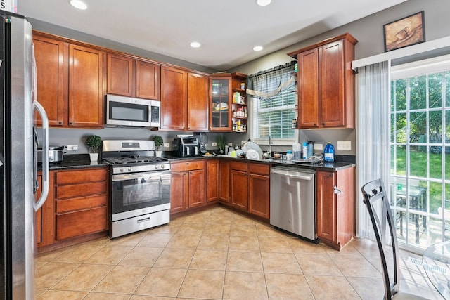 260-262 Chaparral Cir, Elgin, IL 60120 - kitchen featuring appliances with stainless steel finishes, plenty of natural light, recessed lighting, and brown cabinets