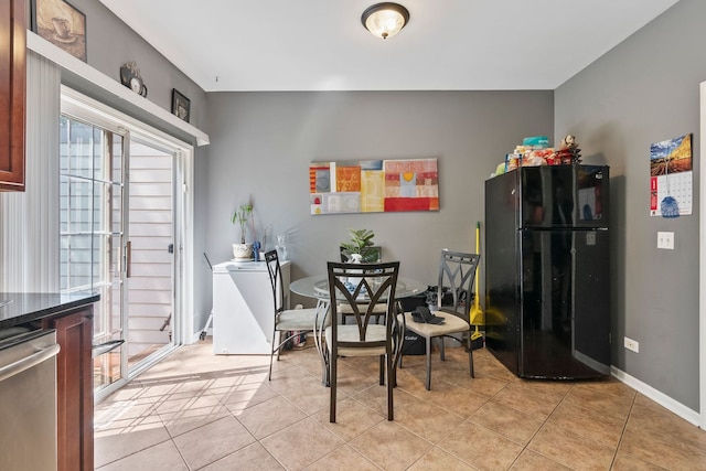 260-262 Chaparral Cir, Elgin, IL 60120 - dining area with light tile patterned flooring and baseboards