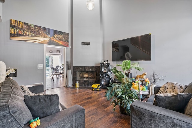 260-262 Chaparral Cir, Elgin, IL 60120 - living area with a high ceiling, wood finished floors, and a fireplace