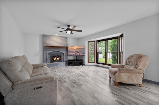 1545 London Ct, Naperville, IL 60563 - living area featuring wood finished floors, a ceiling fan, a fireplace, and baseboards