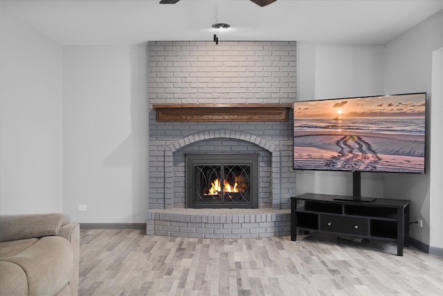 1545 London Ct, Naperville, IL 60563 - living area with wood finished floors, a fireplace, baseboards, and a ceiling fan