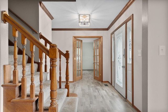 1545 London Ct, Naperville, IL 60563 - entryway with french doors, wood finished floors, baseboards, stairs, and ornamental molding