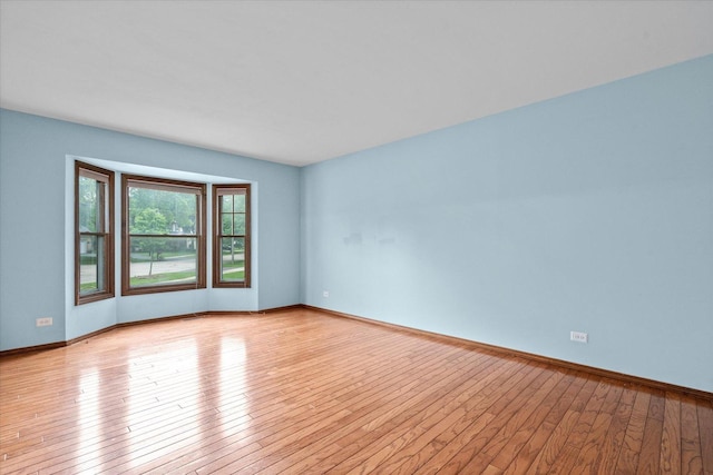 1545 London Ct, Naperville, IL 60563 - spare room with light wood-type flooring and baseboards