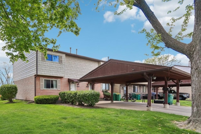 1771 Shoshonee Trl, Wheeling, IL 60090 - back of property featuring brick siding and a yard
