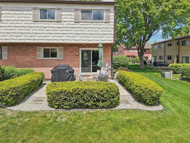 1771 Shoshonee Trl, Wheeling, IL 60090 - back of property with a yard and brick siding