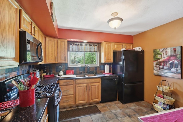 1771 Shoshonee Trl, Wheeling, IL 60090 - kitchen featuring black appliances, dark countertops, light stone finish floors, tasteful backsplash, and a sink