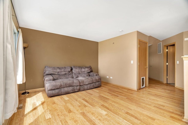 living room featuring light wood-type flooring