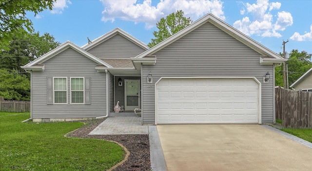 2210 E Michigan Ave, Urbana, IL 61802 - ranch-style home with concrete driveway and a garage