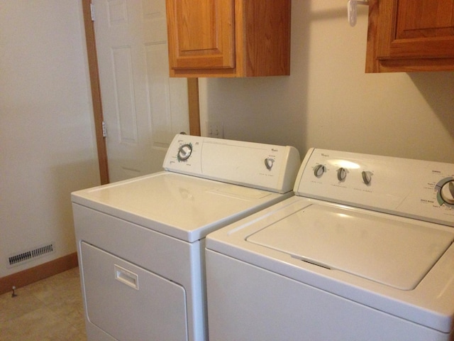2210 E Michigan Ave, Urbana, IL 61802 - laundry room with separate washer and dryer and cabinet space