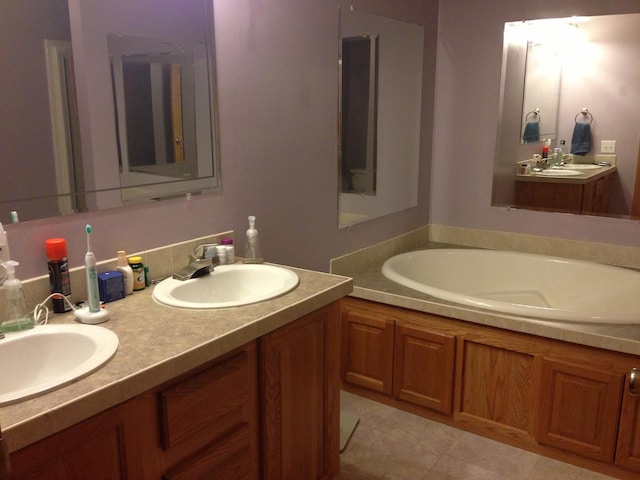 2210 E Michigan Ave, Urbana, IL 61802 - bathroom with double vanity and a garden tub