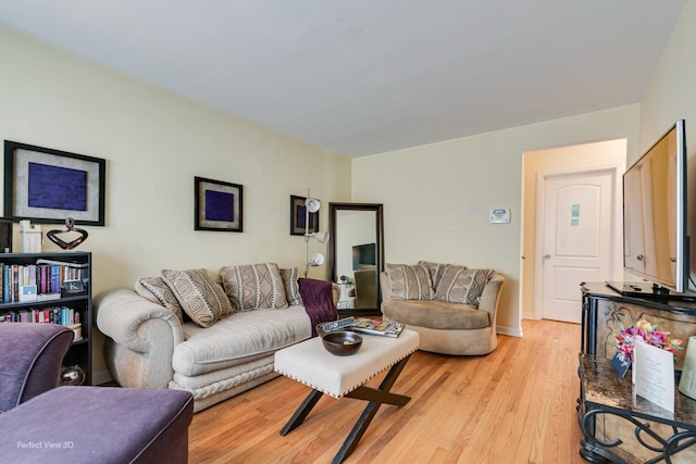 8724 S Jeffery Blvd, Chicago, IL 60617 - living room featuring light wood-style floors