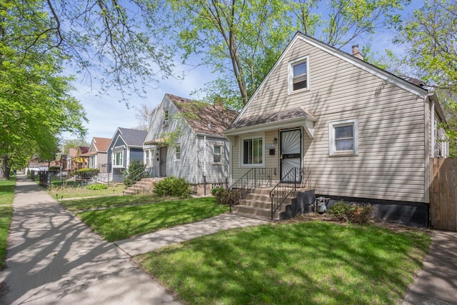 12435 S Perry Ave, Chicago, IL 60628 - view of front facade with a chimney