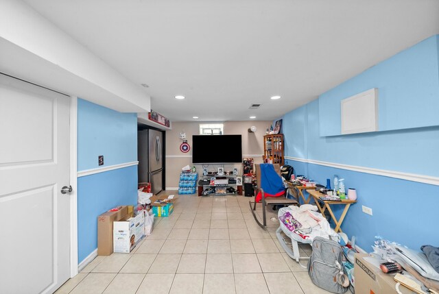 game room featuring light tile patterned flooring and recessed lighting