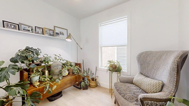 3133 Palmer Dr, Champaign, IL 61822 - sitting room featuring healthy amount of natural light, wood finished floors, and baseboards