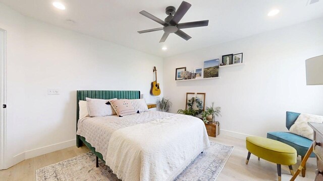 3133 Palmer Dr, Champaign, IL 61822 - bedroom featuring recessed lighting, wood finished floors, baseboards, and ceiling fan