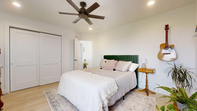 3133 Palmer Dr, Champaign, IL 61822 - bedroom with recessed lighting, light wood-style floors, a closet, and a ceiling fan