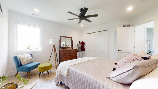 3133 Palmer Dr, Champaign, IL 61822 - bedroom featuring a closet, wood finished floors, recessed lighting, baseboards, and a ceiling fan