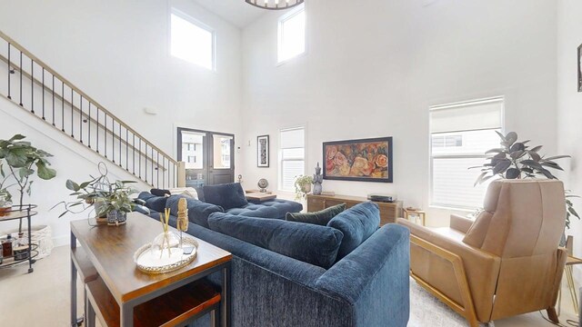 3133 Palmer Dr, Champaign, IL 61822 - living room featuring a towering ceiling and stairway