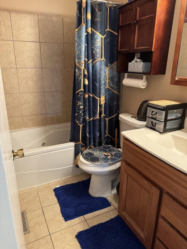 bathroom featuring tile patterned floors, toilet, shower / bath combo with shower curtain, and vanity