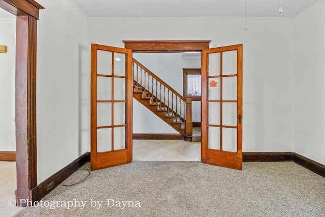 491 S Dearborn Ave, Kankakee, IL 60901 - carpeted spare room with french doors, ornamental molding, baseboards, and stairway