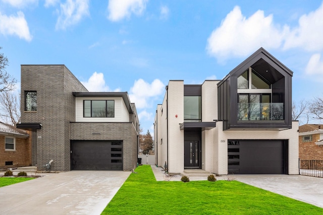 8115 E Prairie Rd, Skokie, IL 60076 - contemporary home featuring an attached garage, brick siding, and driveway