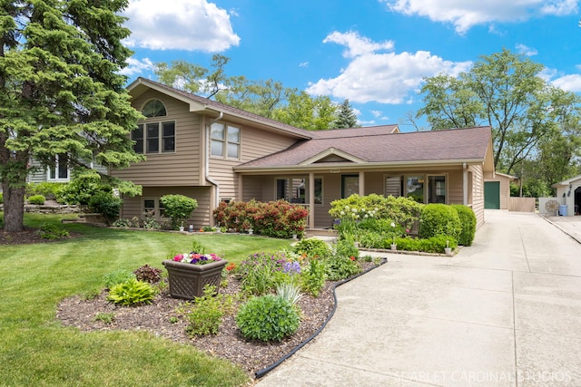 1045 S Grace St, Lombard, IL 60148 - split level home featuring covered porch, a front yard, and roof with shingles