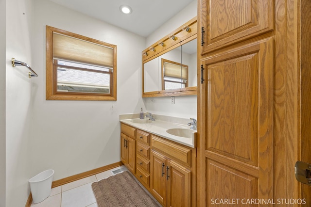 1045 S Grace St, Lombard, IL 60148 - bathroom featuring double vanity, baseboards, tile patterned floors, and recessed lighting
